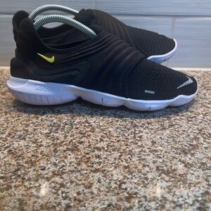 Nike Black Slip-On Athletic Shoes with White Sole and Neon Yellow Swoosh